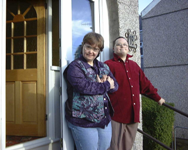 Carol and David living in their own home.